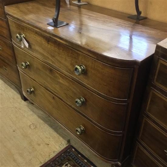 Early 19C mahogany bow-fronted three-drawer chest